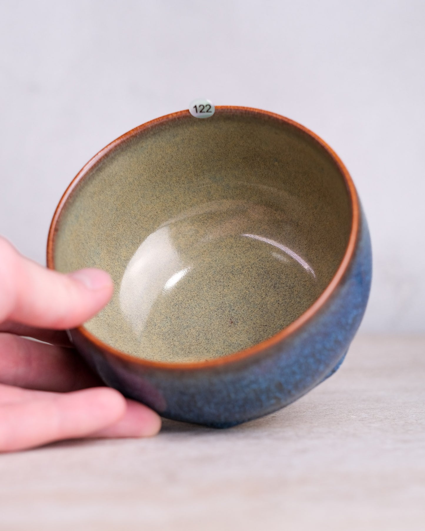 122. A hand-thrown bowl, thrown, specific piece