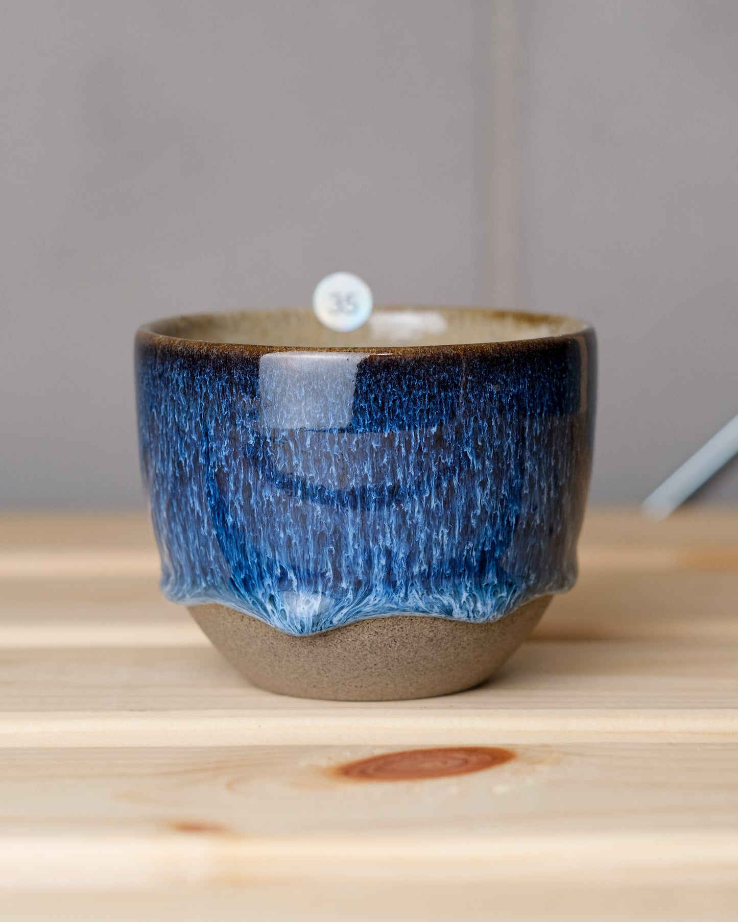 035. 160-200 ml cup, thrown, a specific piece