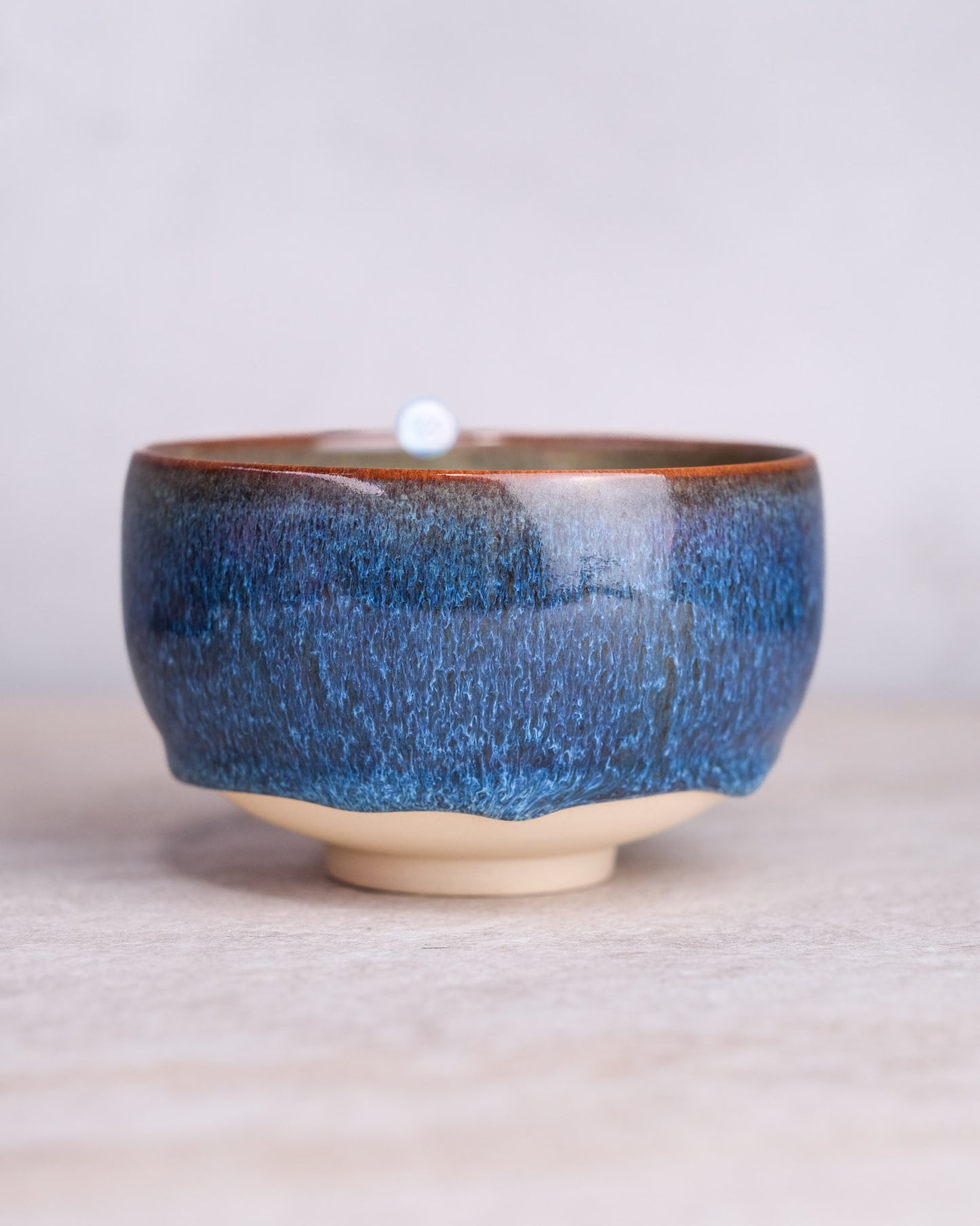 122. A hand-thrown bowl, thrown, specific piece