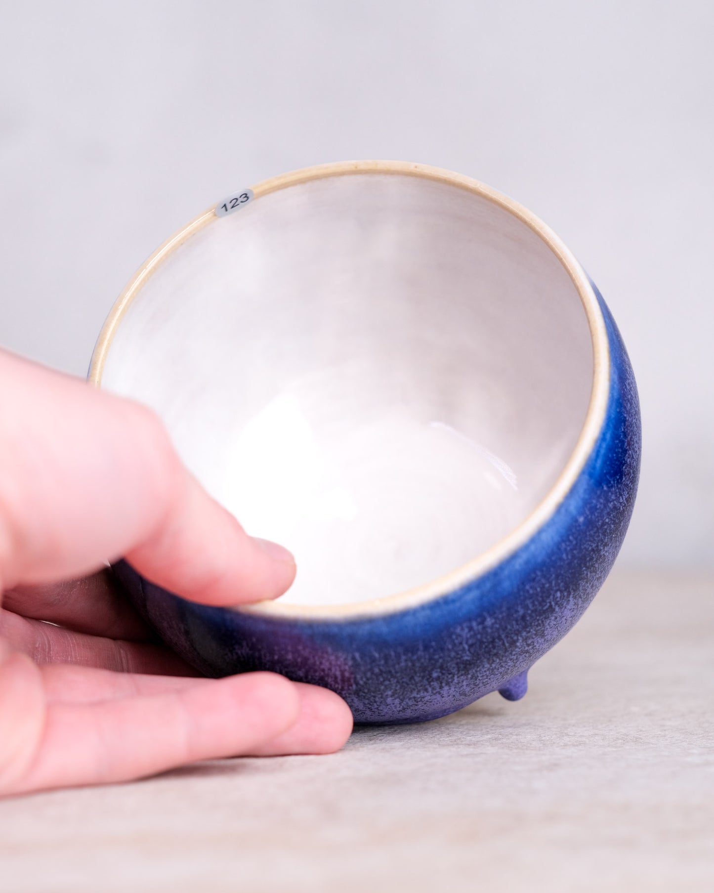 123. A hand-thrown bowl, thrown, specific piece