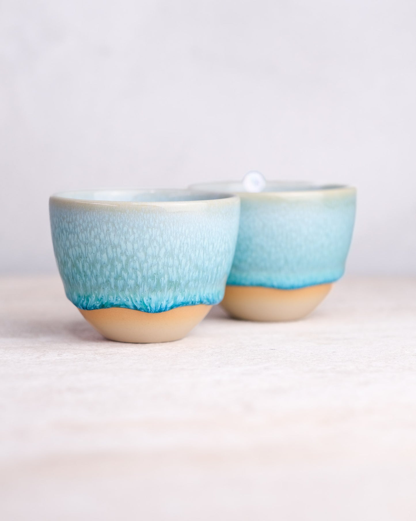136. Pair of cappuccino 200ml, slipcasted