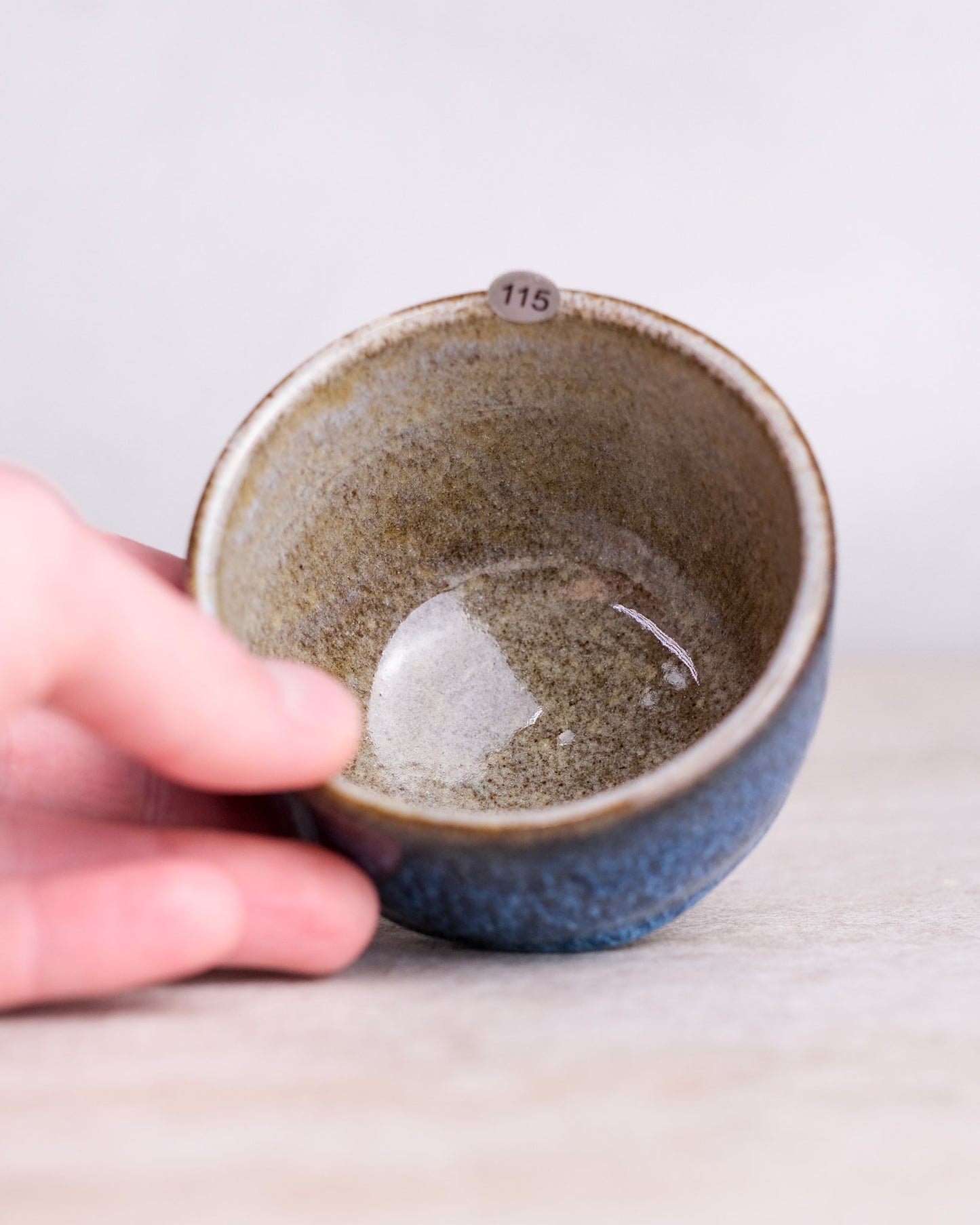 115. 180-200 ml cup, thrown, specific piece